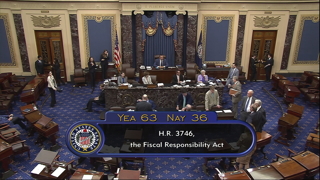 In this image from Senate Television, the final vote of 63-36 shows passage of the bill to raise th...