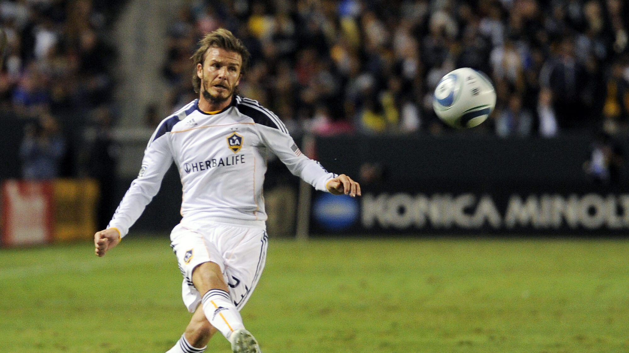 Los Angeles Galaxy midfielder David Beckham kicks during the second half of their MLS Western Confe...