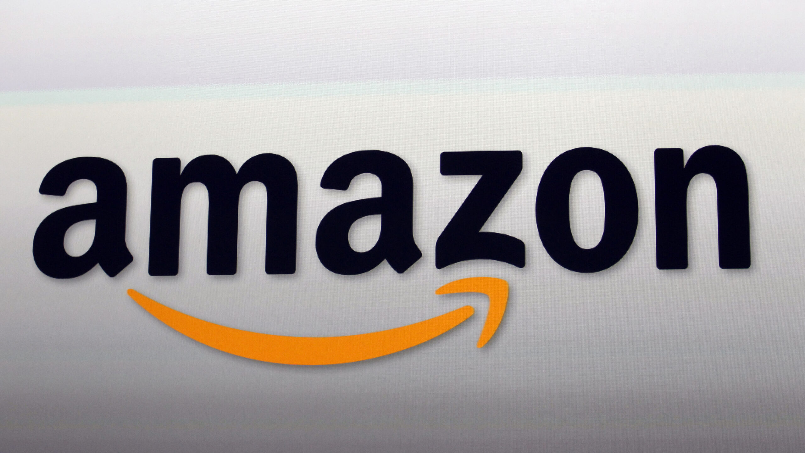 Image of Amazon logo. U.S. regulators and 17 states are suing Amazon over allegations the e-commerc...