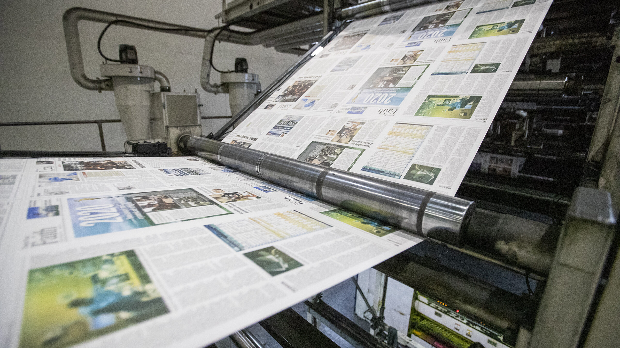 The presses begin rolling as the last daily edition of the Deseret News is printed at the MediaOne ...