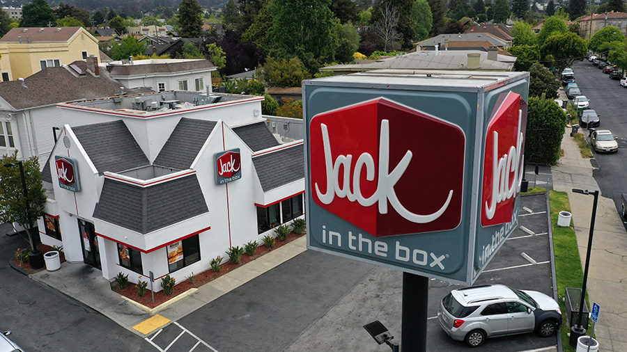 BERKELEY, CALIFORNIA - MAY 12: In an aerial view, a sign is posted in front of a Jack in the Box re...