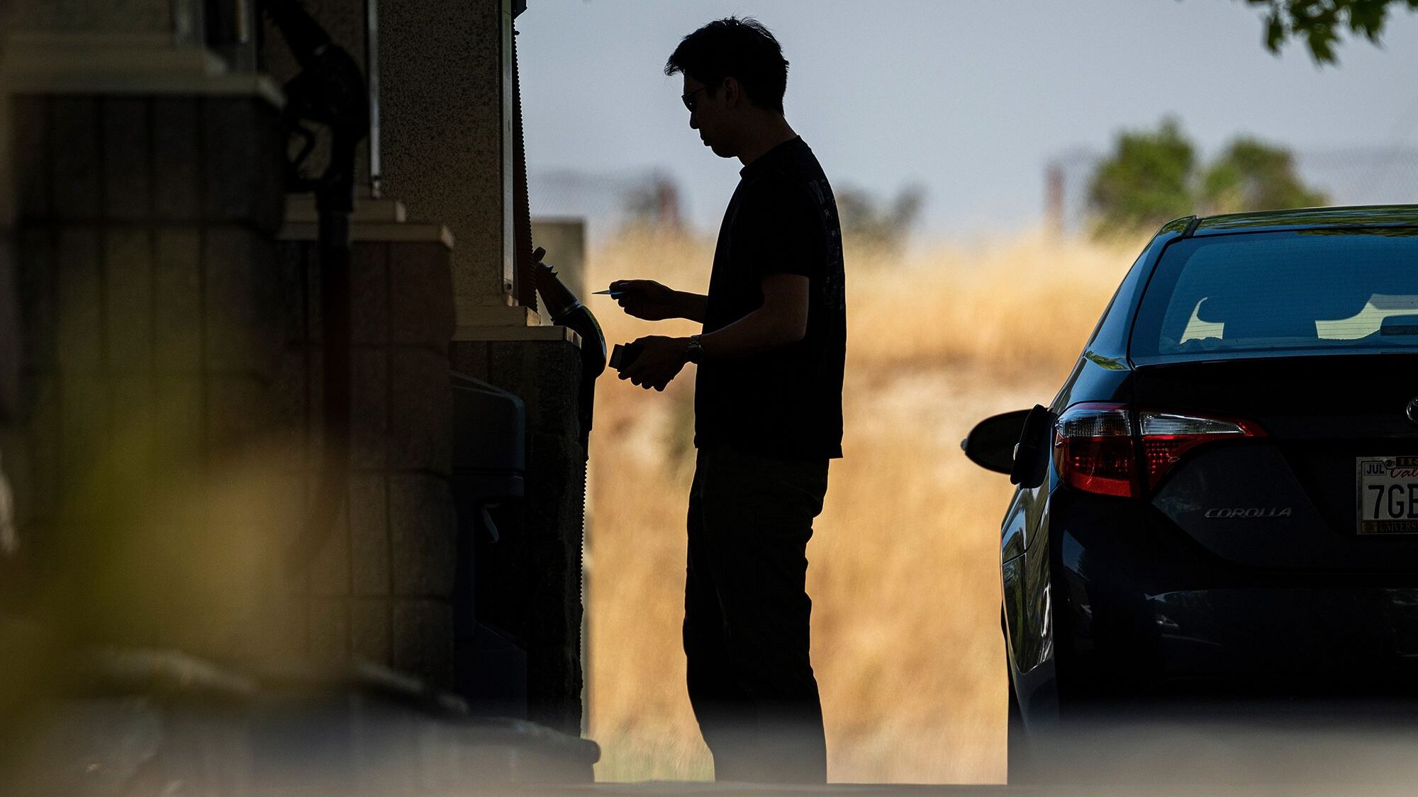 A customer refuels at a Shell gas station in Hercules, California, on May 23, as US gasoline demand...