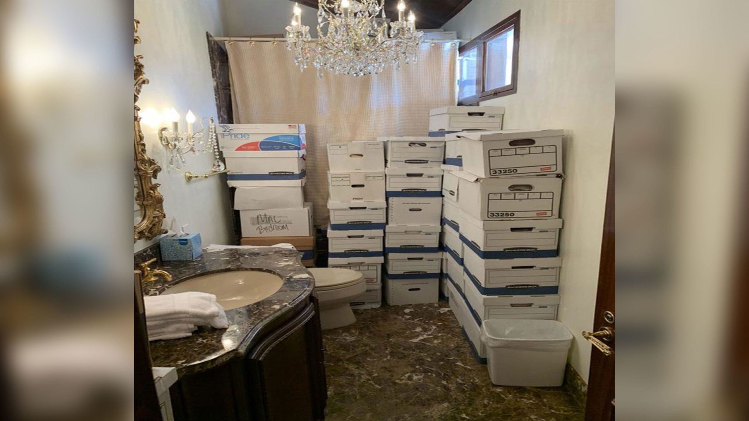 Boxes of classified documents are stored inside a bathroom and shower inside the Mar-a-Lago Club's ...