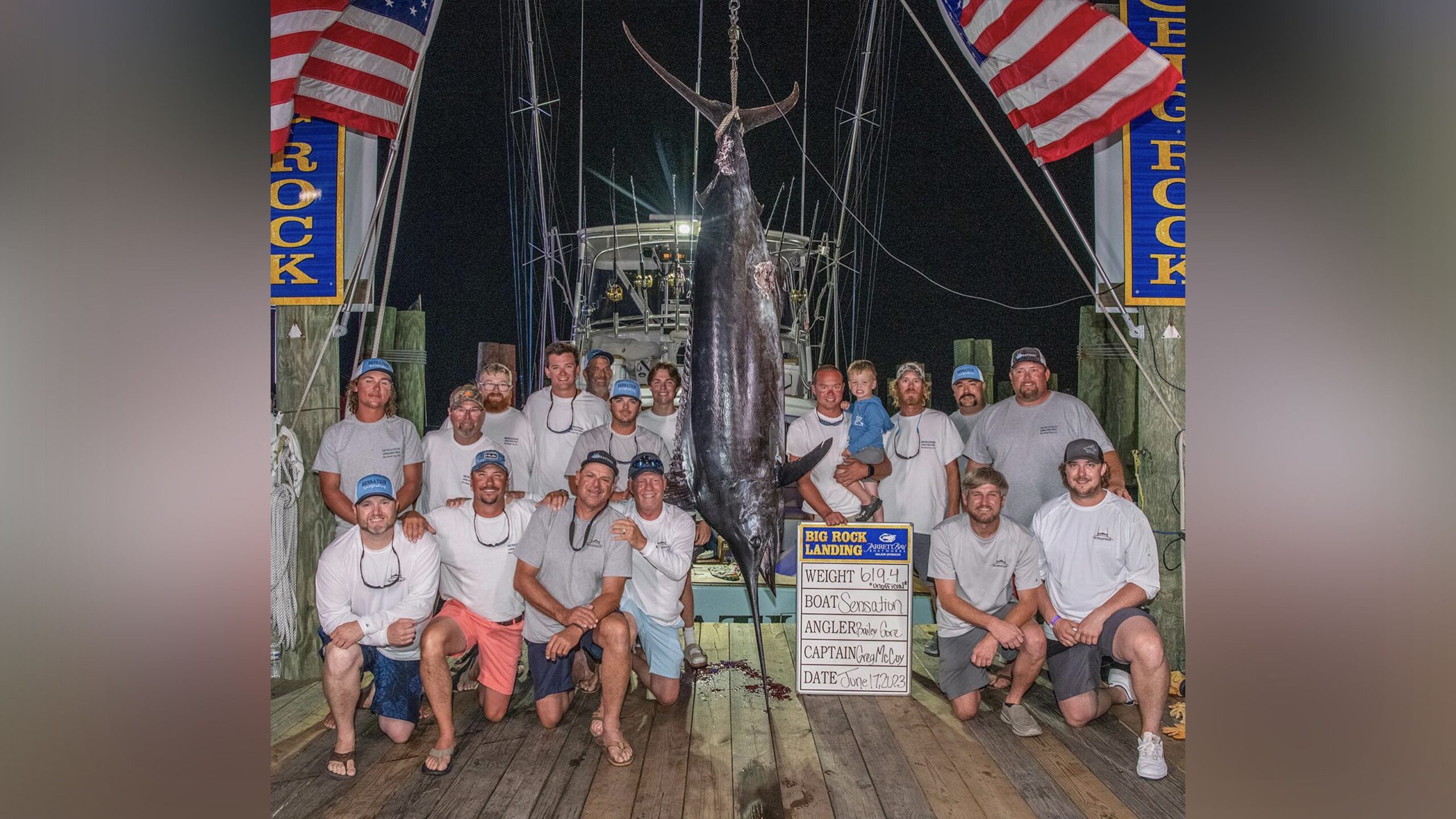 The crew of Sensation pose with the massive blue marlin that was disqualified by fishing tournament...