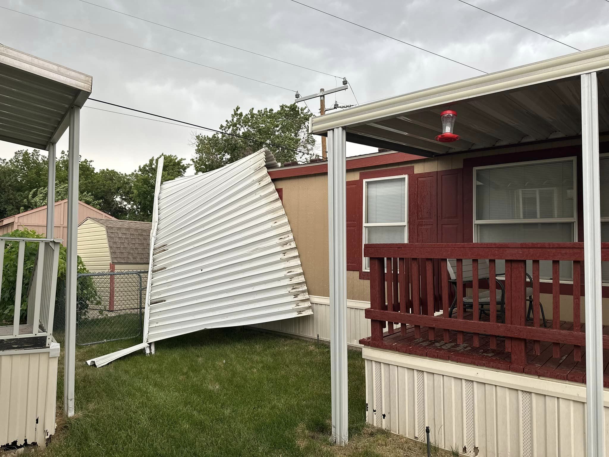 Monday evening's severe thunderstorm did damage to this home in Riverdale. Photo credit: Alan Murph...