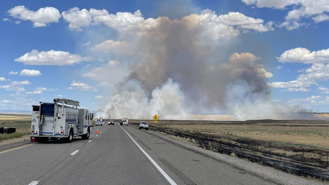 Smoke billows from a fire near I-70. A wildfire has closed I-70 in both directions, just west of th...