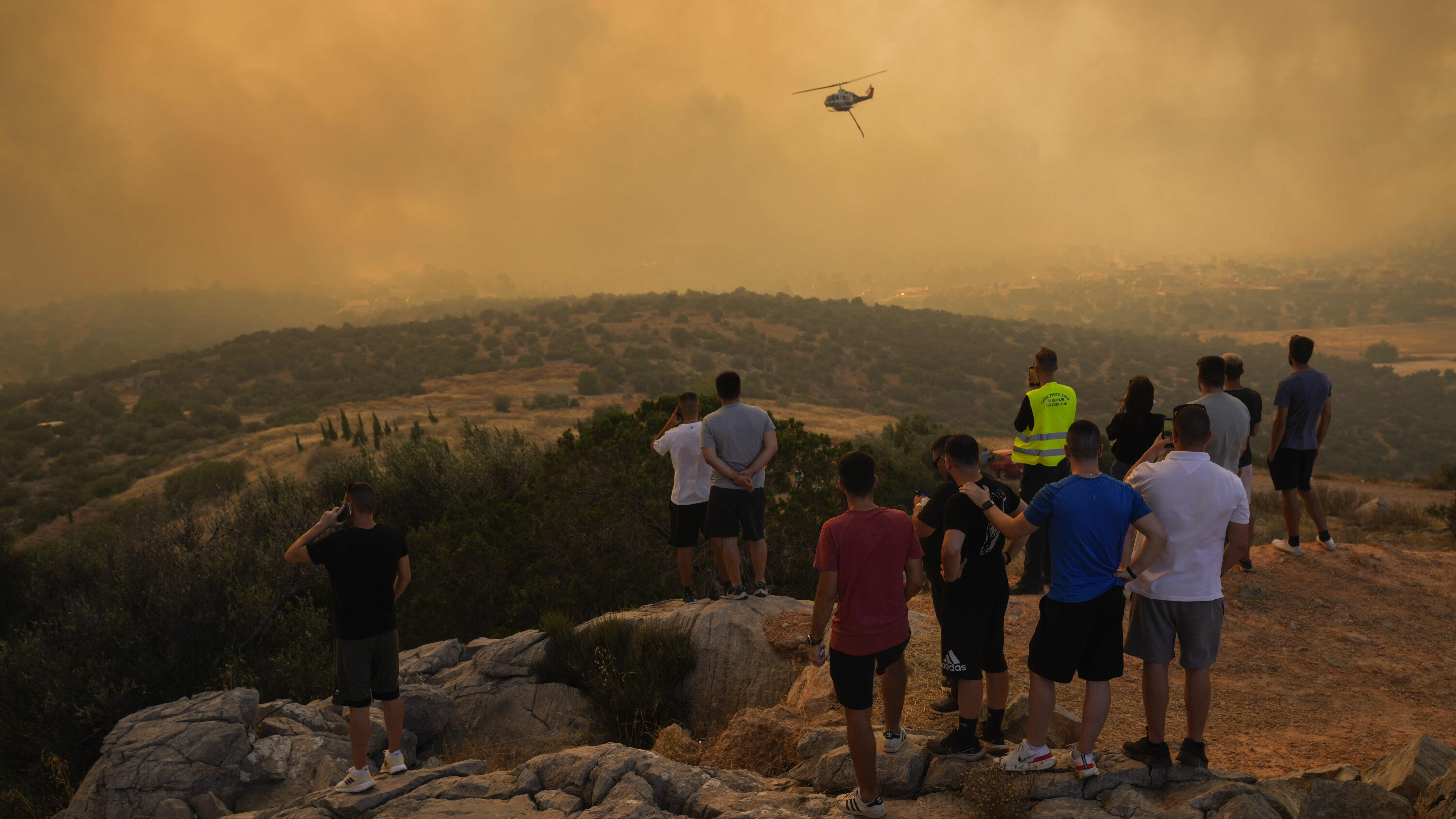 ATHENS, Greece (AP) — A large wildfire burning on the Greek island of Rhodes for a fifth day has ...