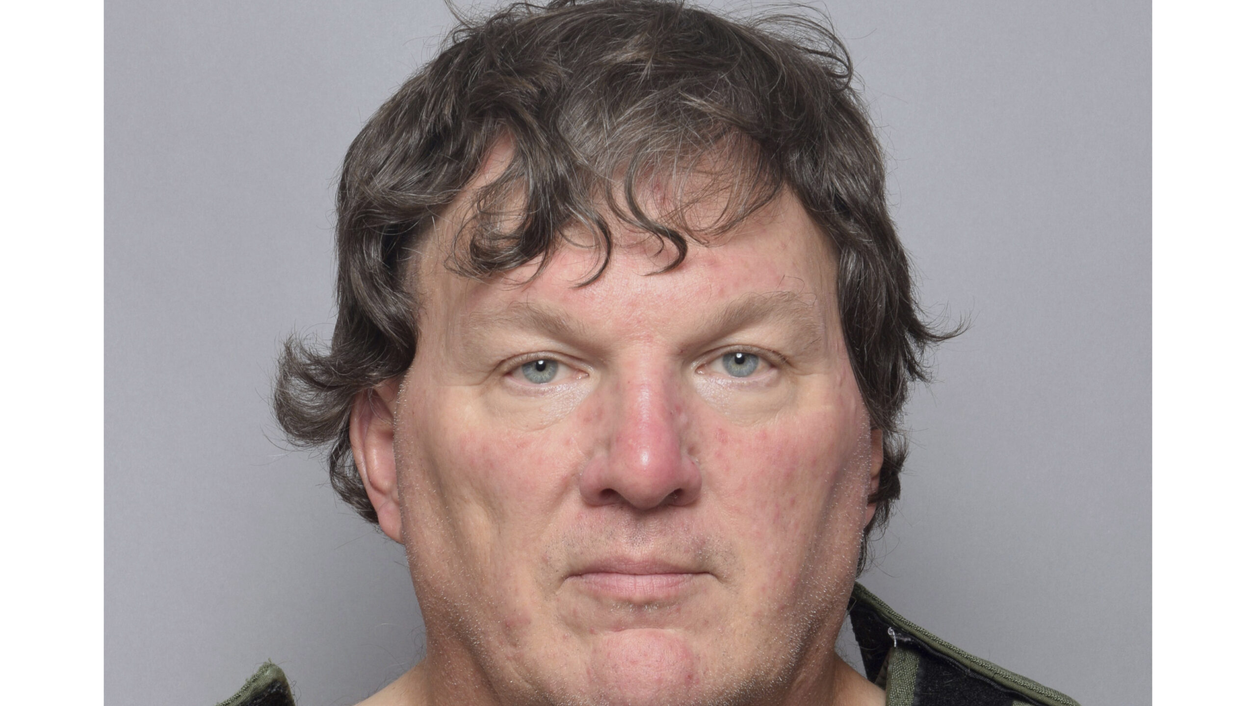 This booking image provided by Suffolk County Sheriff’s Office, shows Rex Heuermann, a Long Islan...
