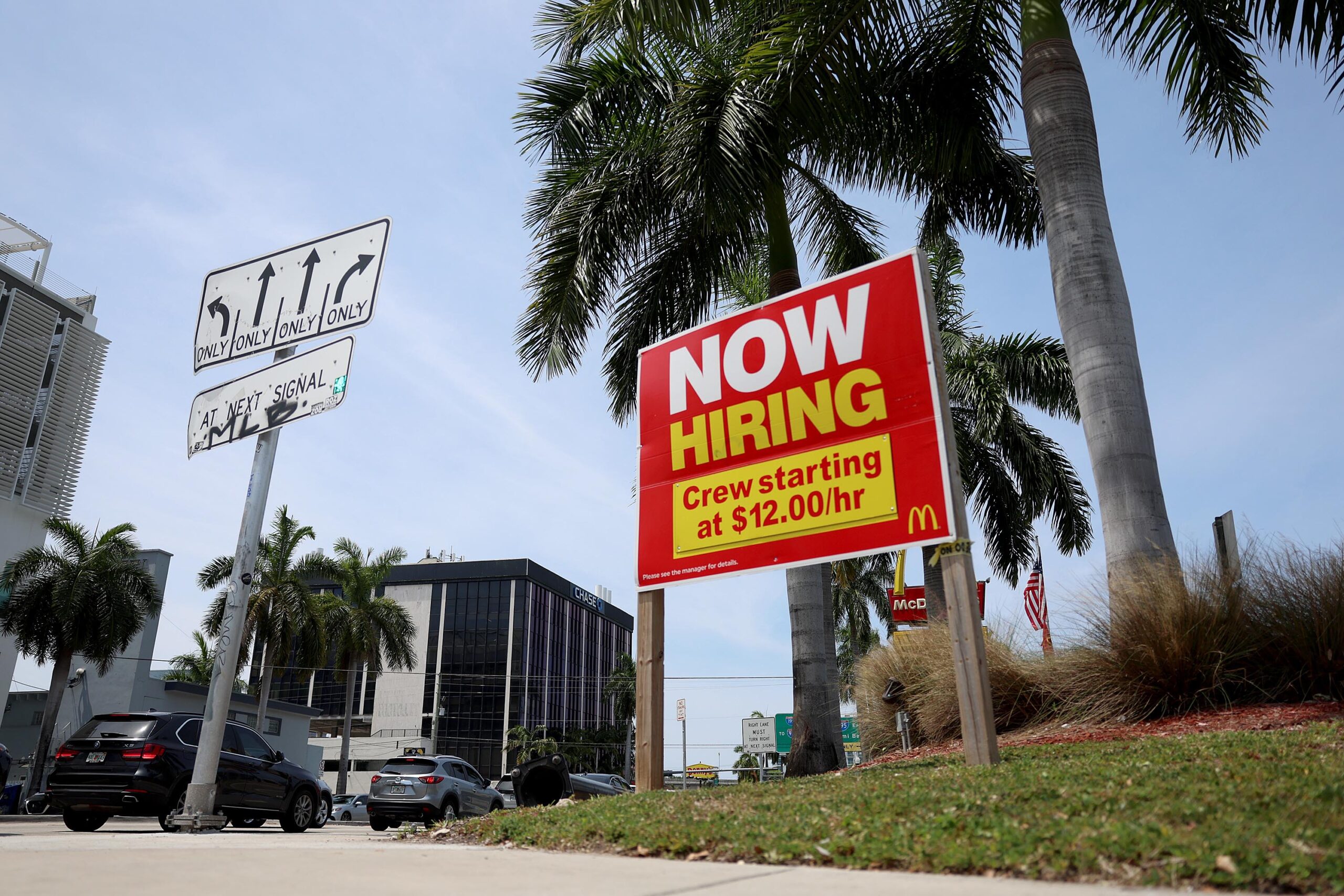 A 'Now Hiring' sign posted outside of a restaurant looking to hire workers on May 05, in Miami.
(Cr...