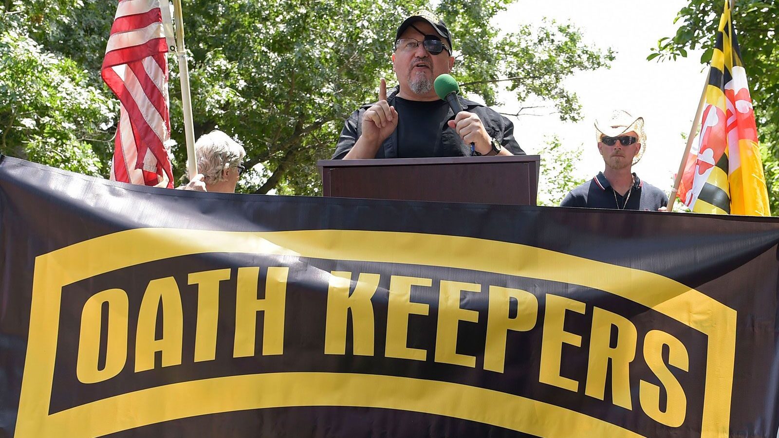Stewart Rhodes, founder of the Oath Keepers, center, speaks during a rally outside the White House ...