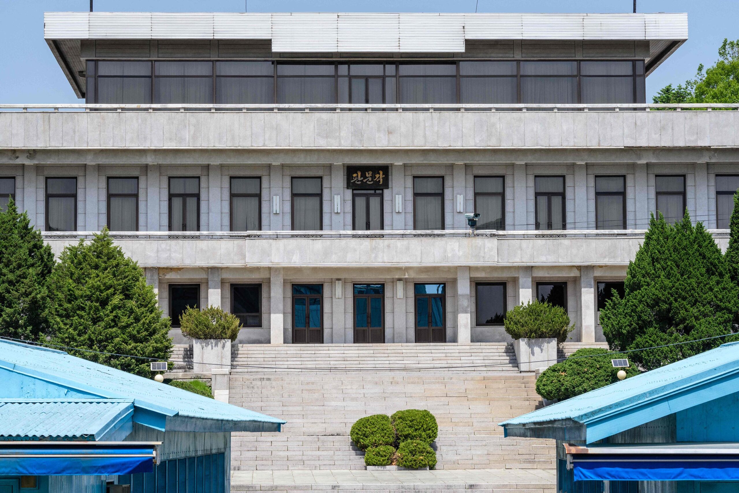 This photo, taken on May 9, shows North Korea's Panmon Hall (back) from the truce village of Panmun...