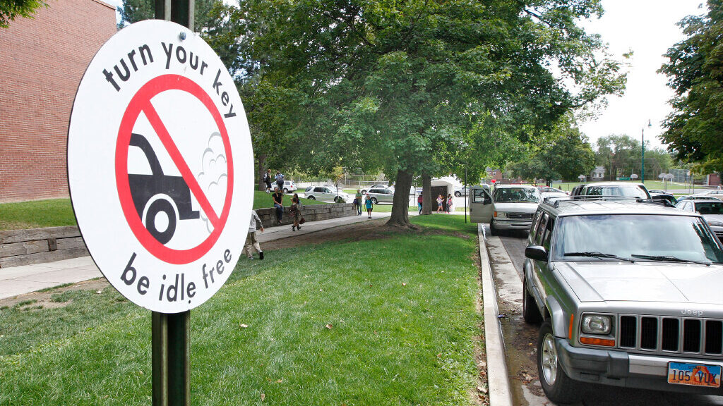 A sign reads "turn your key be idle free." A new study by researchers at the University of Utah fou...