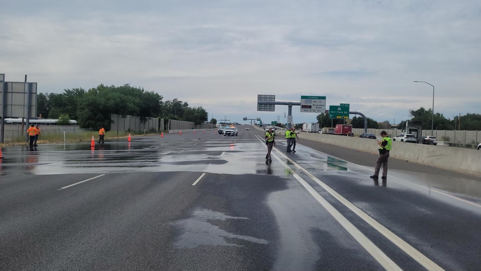 crews look at water on sb i-15 in layton that caused a closure...