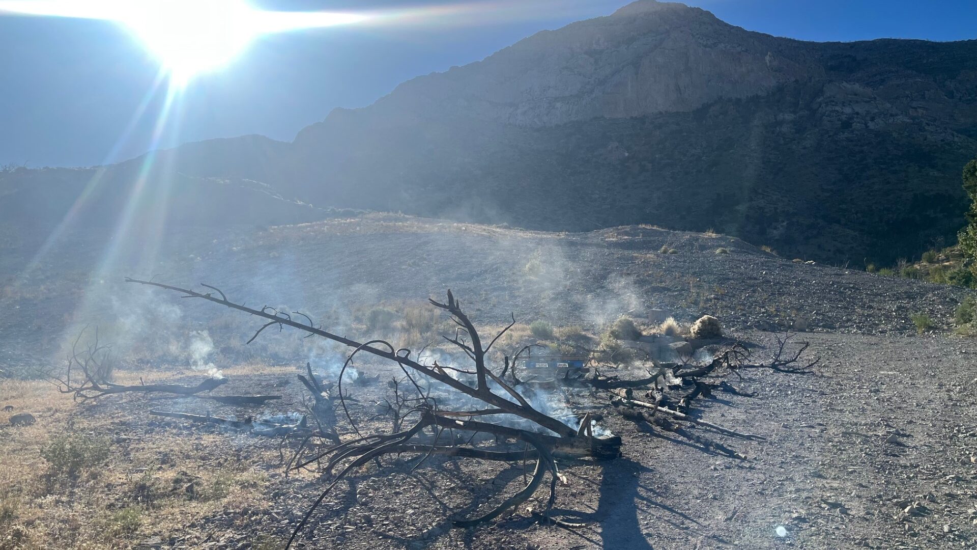 Image of the remnants of a fire started by somebody else, but put out by southern Utah climbers. Th...