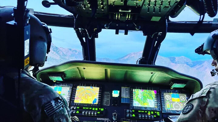 Image of Utah National Guard pilot flying rescue helicopter. On Thursday morning, the Utah National...