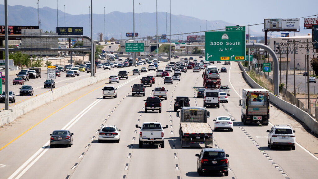 Traffic moves on I-15 in Salt Lake City....