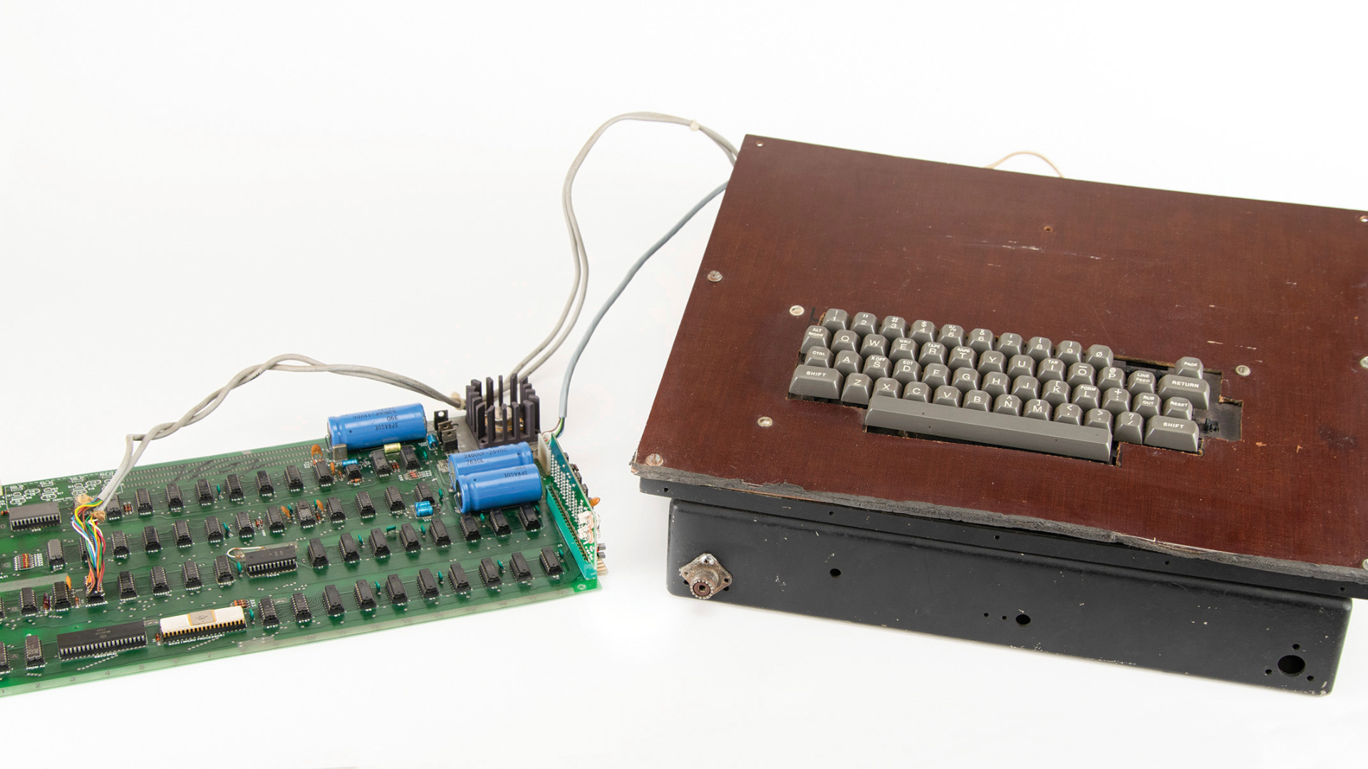 This photo provided by RR Auction shows a vintage Apple computer built in the 1970s and signed by c...