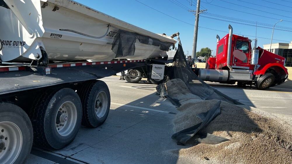 A semi pictured with spilled sand. Six miles of traffic is stopped on northbound I-15 between Orem ...