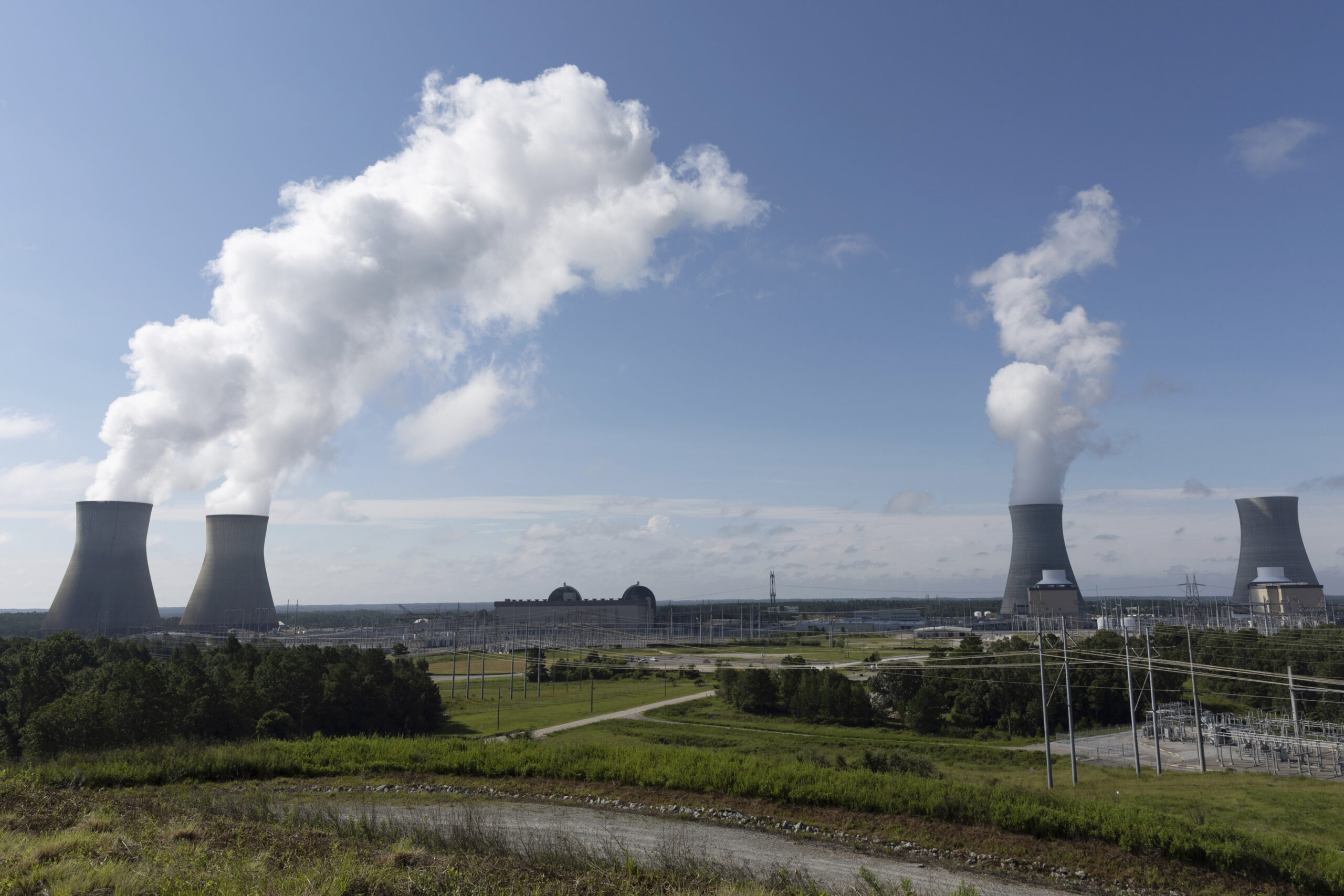 Nuclear reactors and cooling towers of the four units of Plant Vogtle, a nuclear plant near Waynesb...