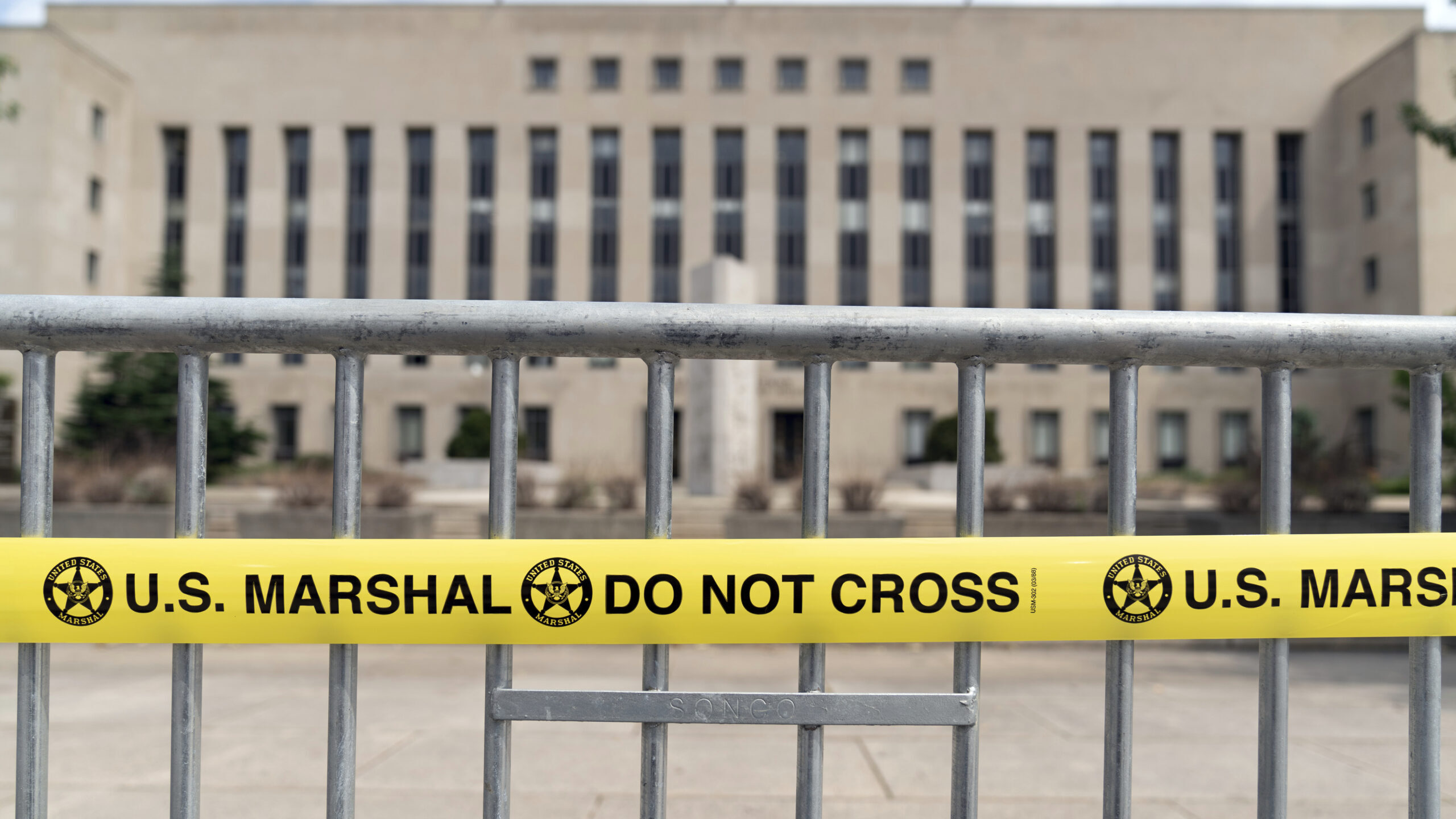 The E. Barrett Prettyman U.S. Federal Courthouse is seen behind barricades, before the arrival of f...