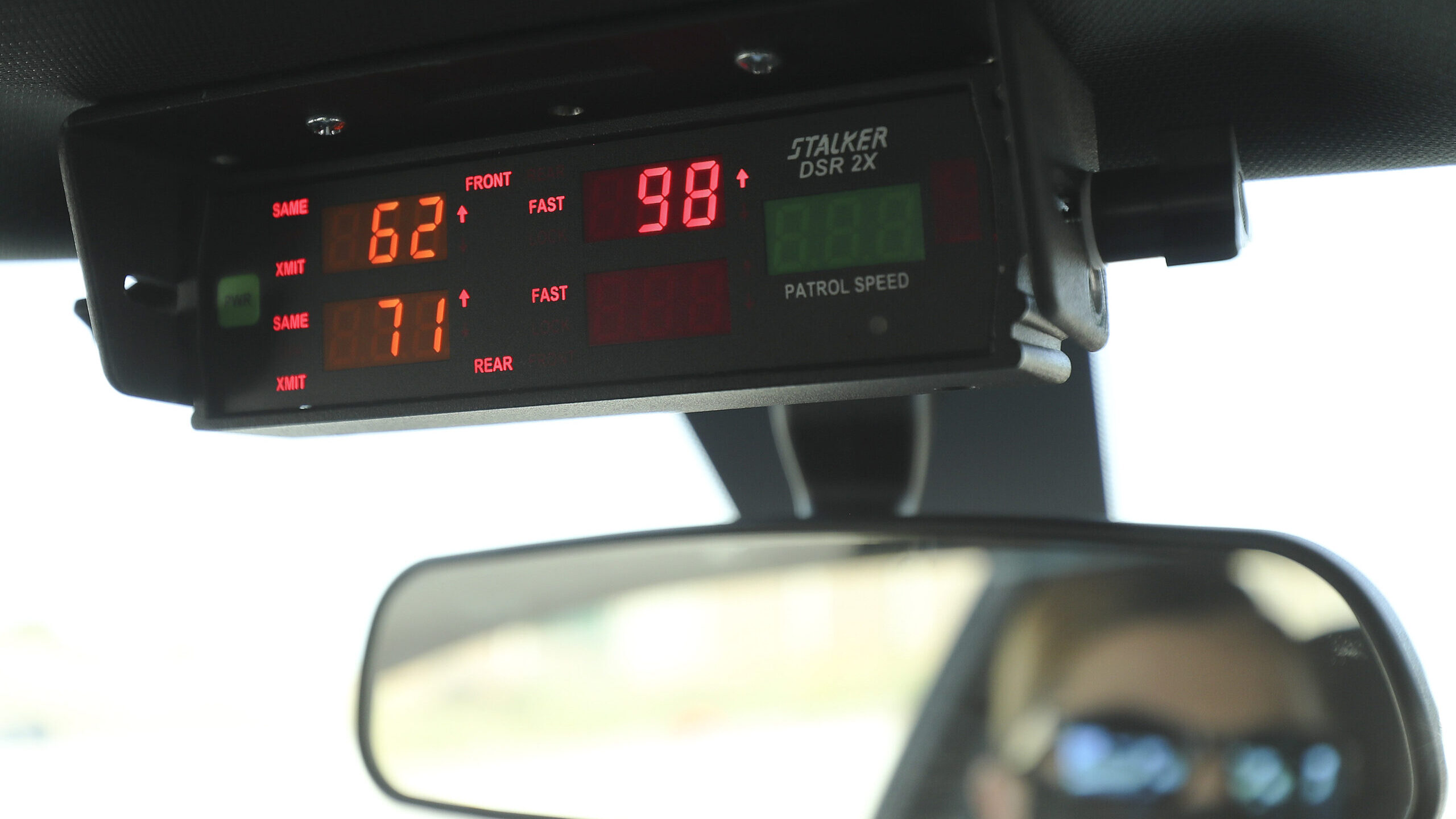 Image of a Utah Highway Patrol trooper monitoring freeway speeds in Davis County, Utah. New researc...