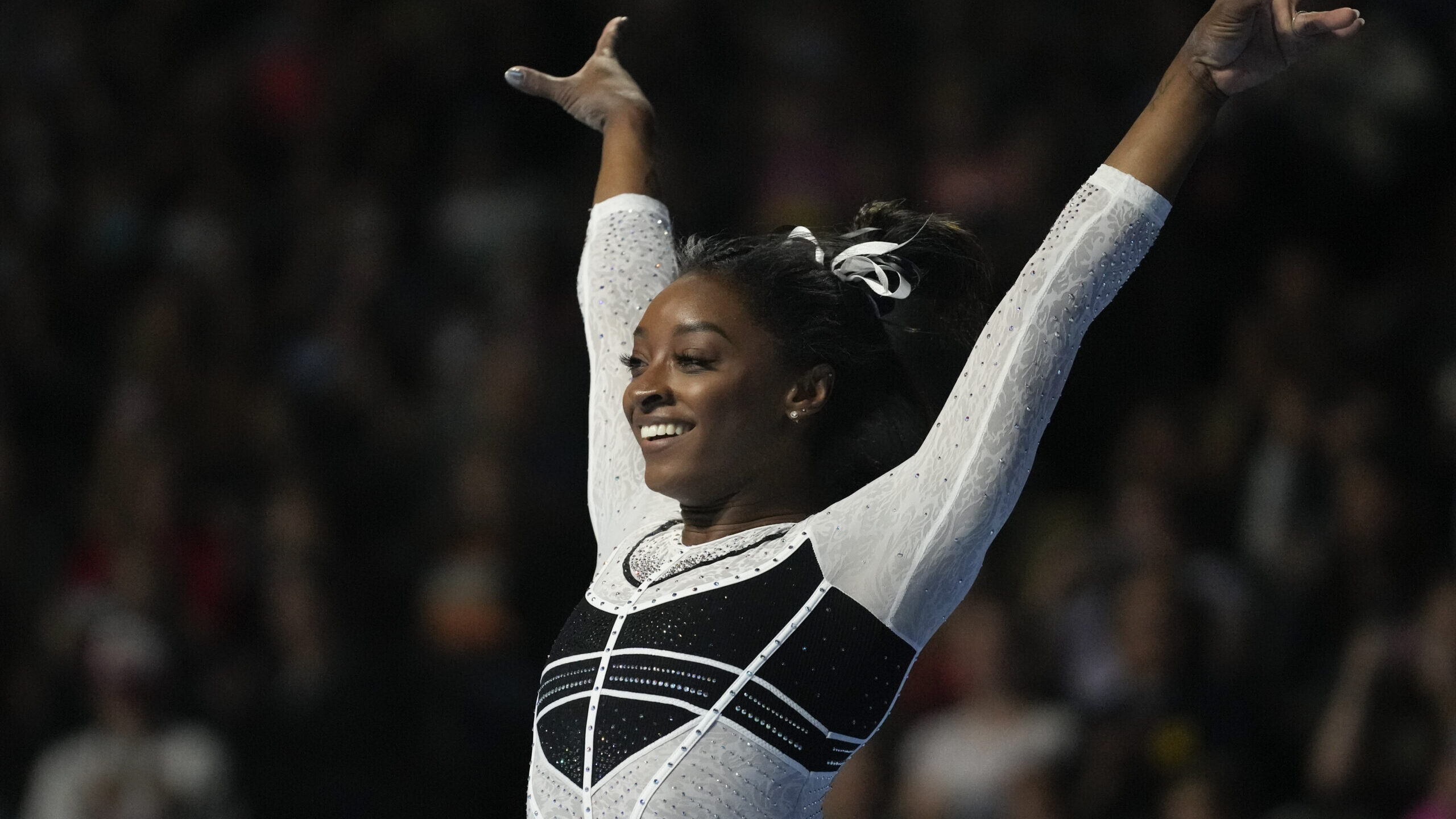 HOFFMAN ESTATES, Ill. (AP) — Simone Biles spent two years trying to distance herself from those s...