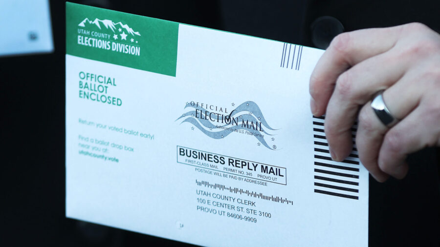 Image of a voter holding a mail-in ballot in Provo in Nov., 2022. A Utah lawmaker will propose legi...