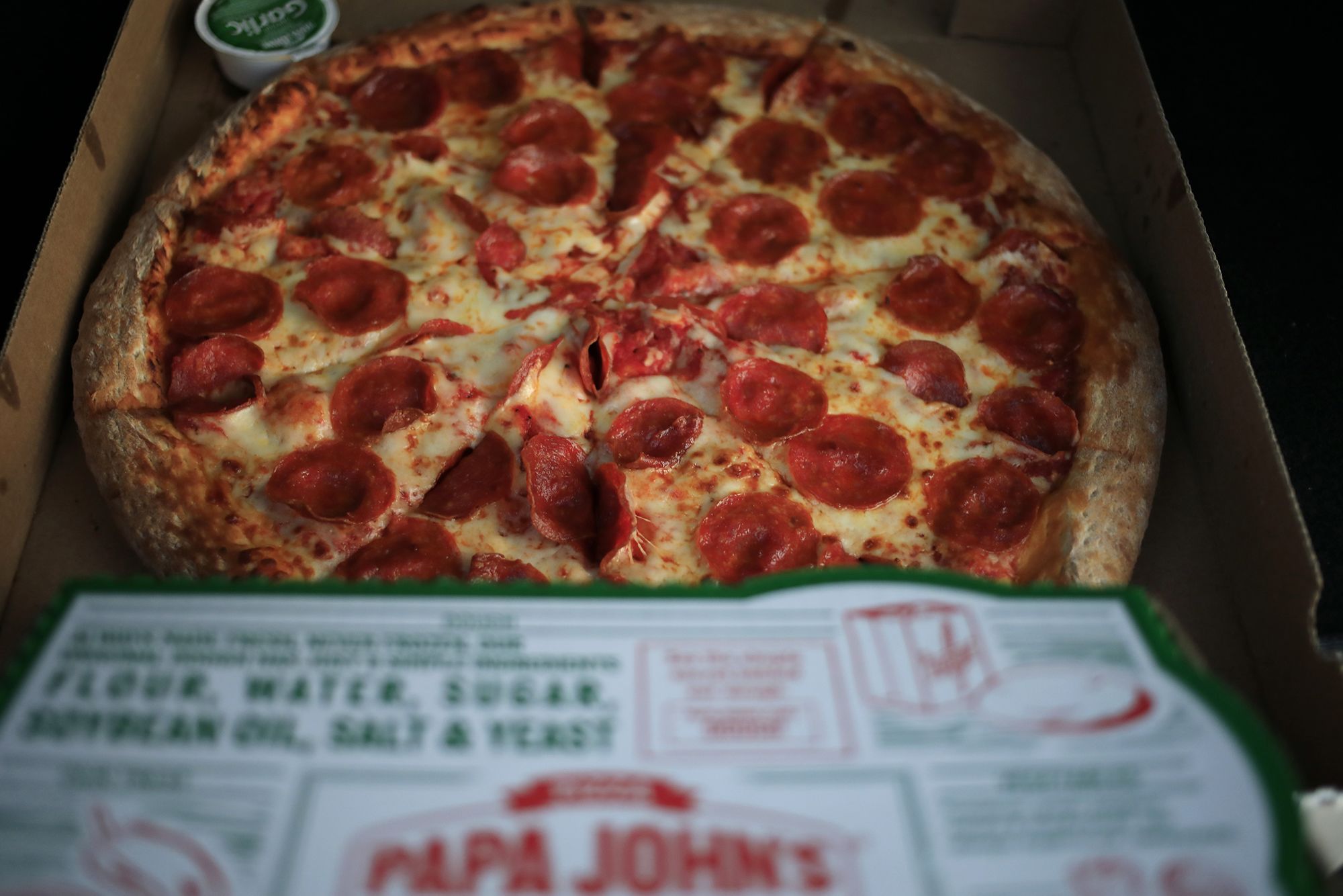Sales at Papa Johns locations open at least a year fell in the second quarter. Photo credit: Luke S...
