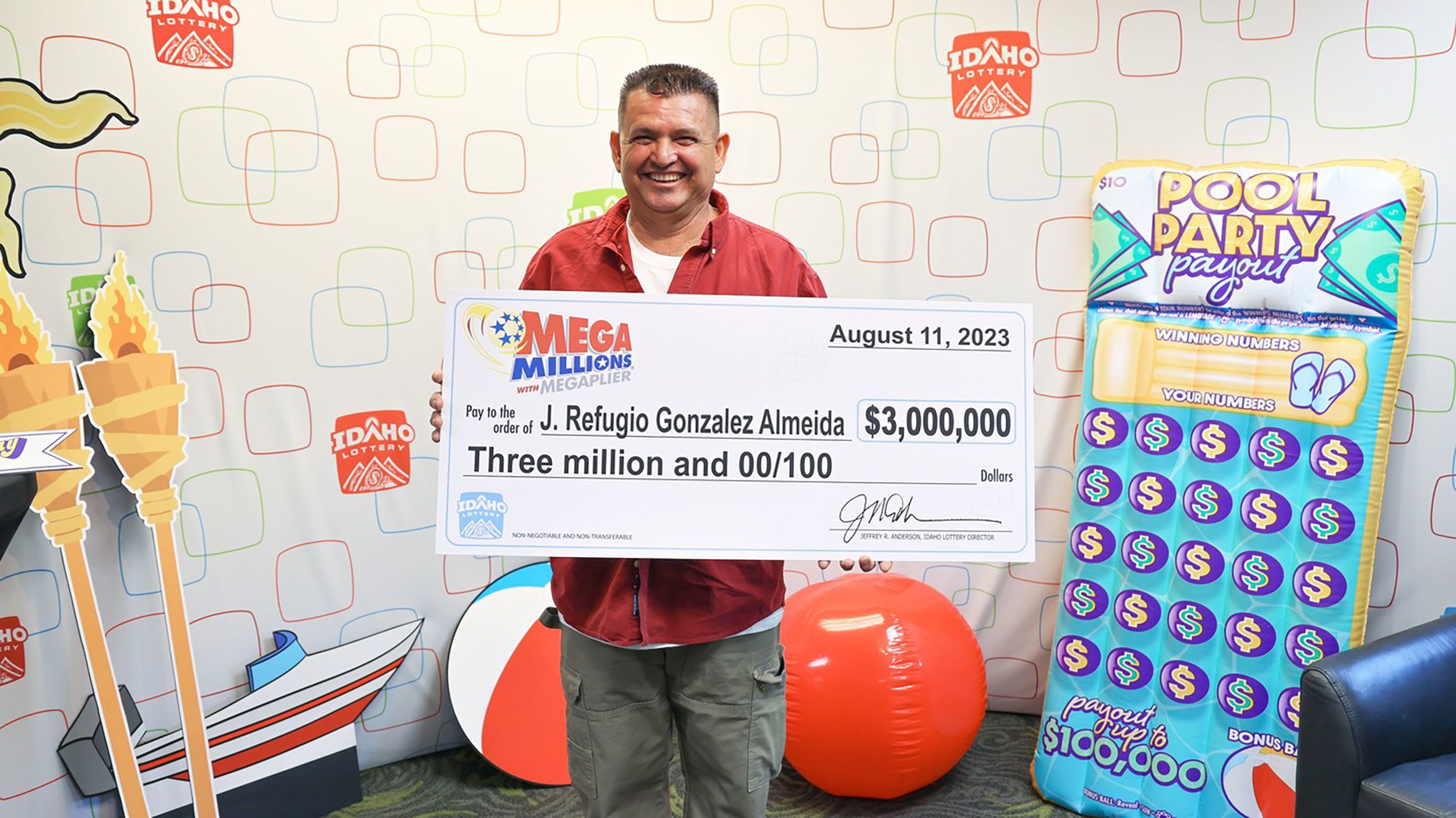 J. Refugio Gonzalez Almeida holds a ceremonial winning check on the Idaho Lottery's Instagram page....