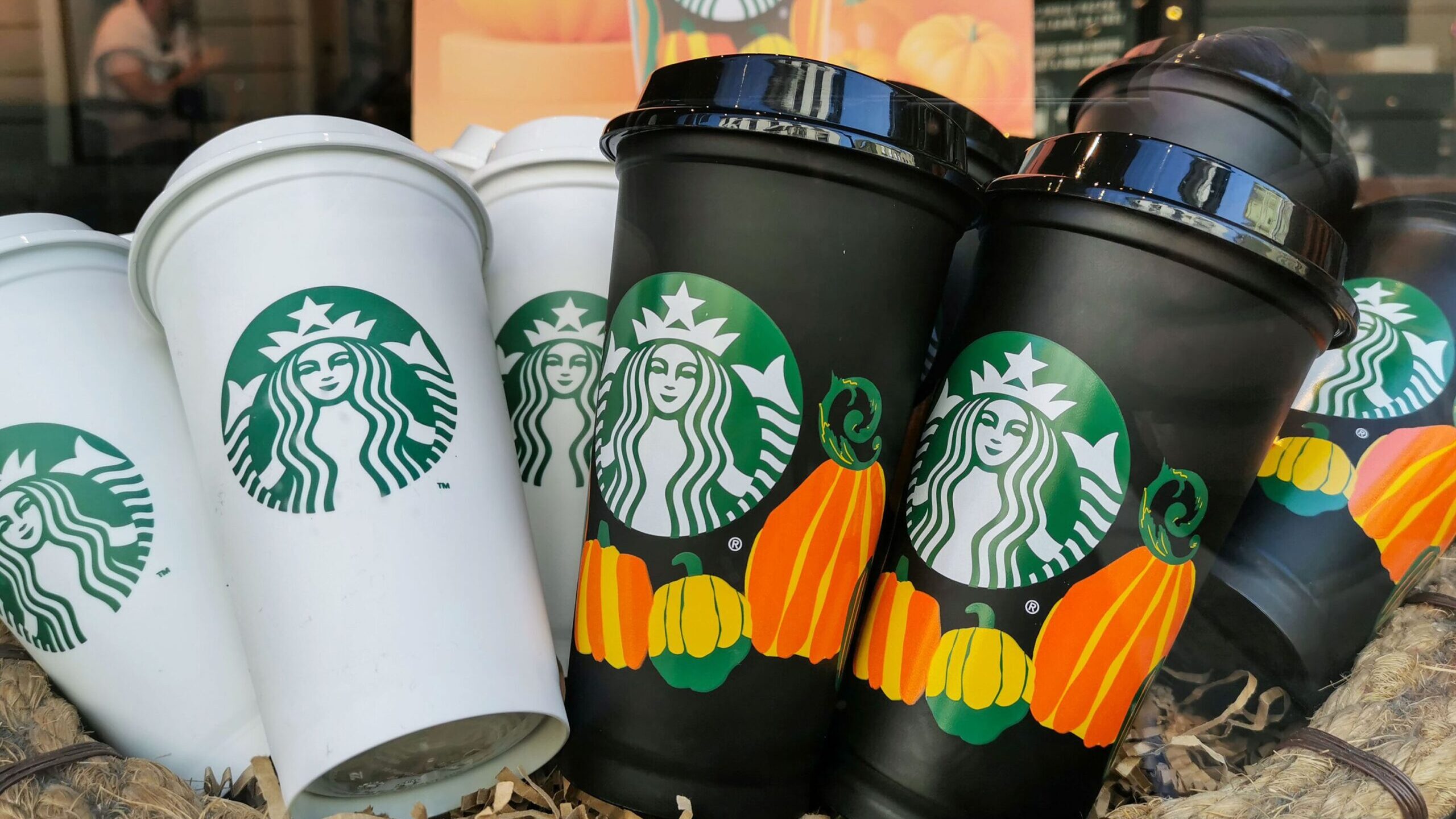 Image of Starbuck's pumpkin spice latte to-go coffee cups. If you think those drinks represent pump...