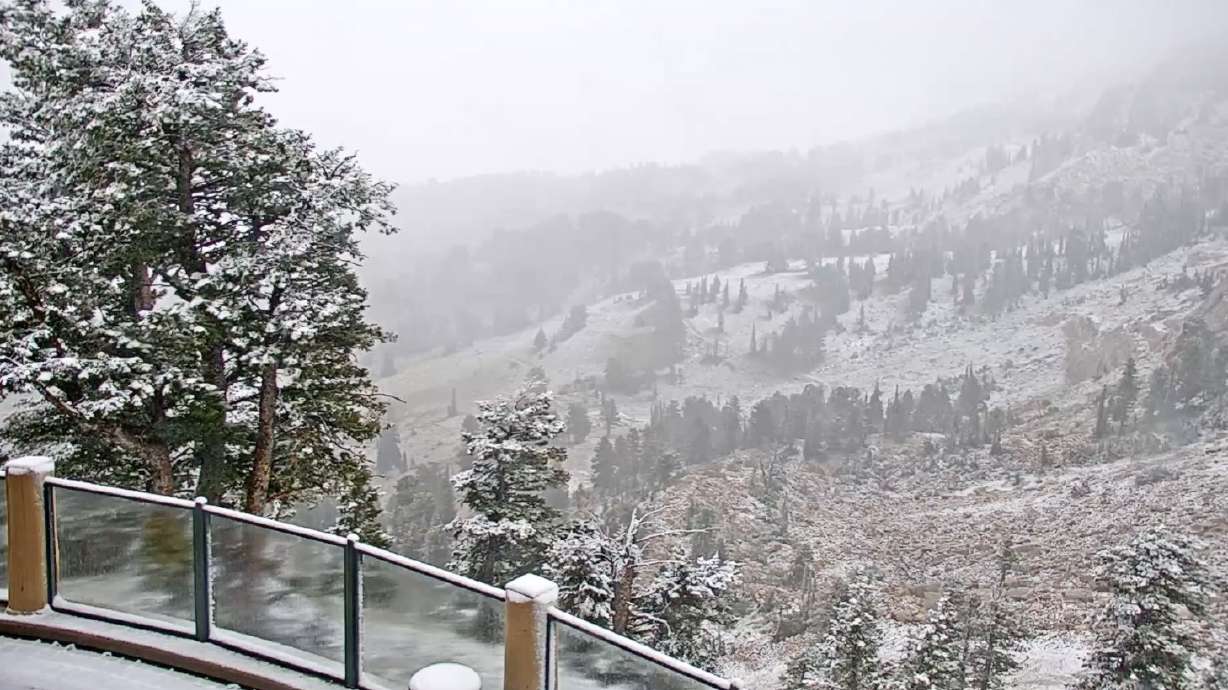 Snow falls by the John Paul Lodge at Snowbasin Resort in Huntsville on Thursday. Rain, snow and muc...
