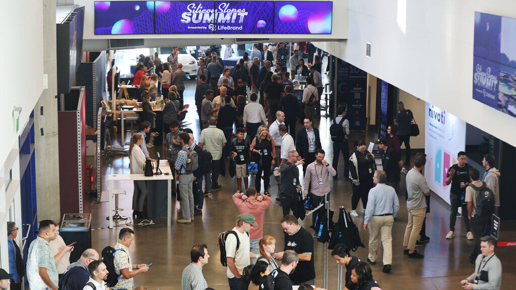 Attendees gather for the eighth annual Silicon Slopes Summit at the Delta Center in Salt Lake City....