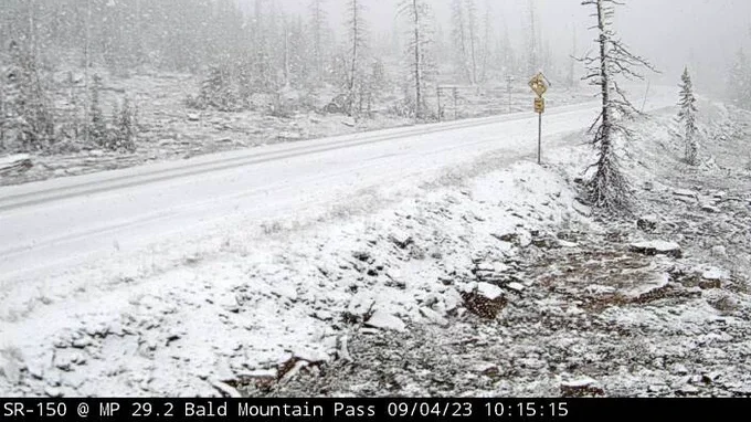 SR-150 through Bald Mountain Pass in the Uintah Mountains near milepost 29 is covered with snow. Ph...
