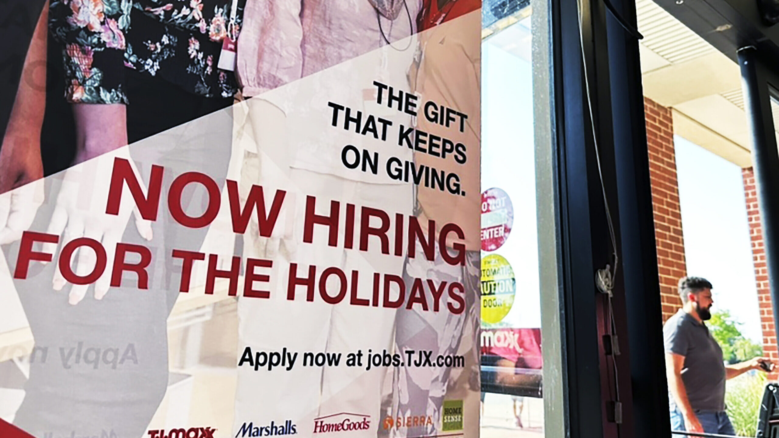 A hiring sign is displayed at a retail store in Vernon Hills, Ill. A new study shows most people li...