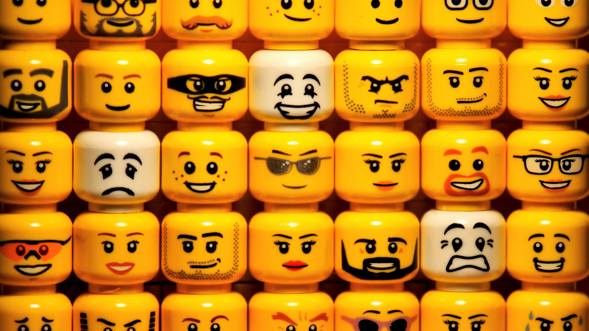 Image of Lego heads. Lego will keep looking for a sustainable replacement for plastic after their e...