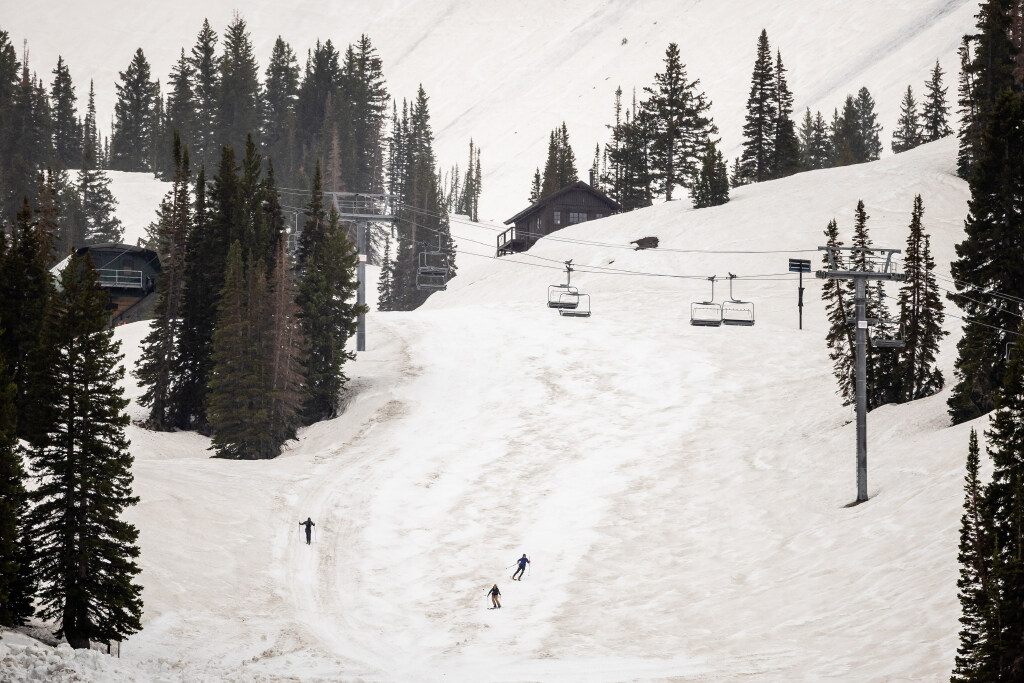 Backcountry skiers make use of the record-breaking snowpack to make some turns at Alta Ski Area, wh...