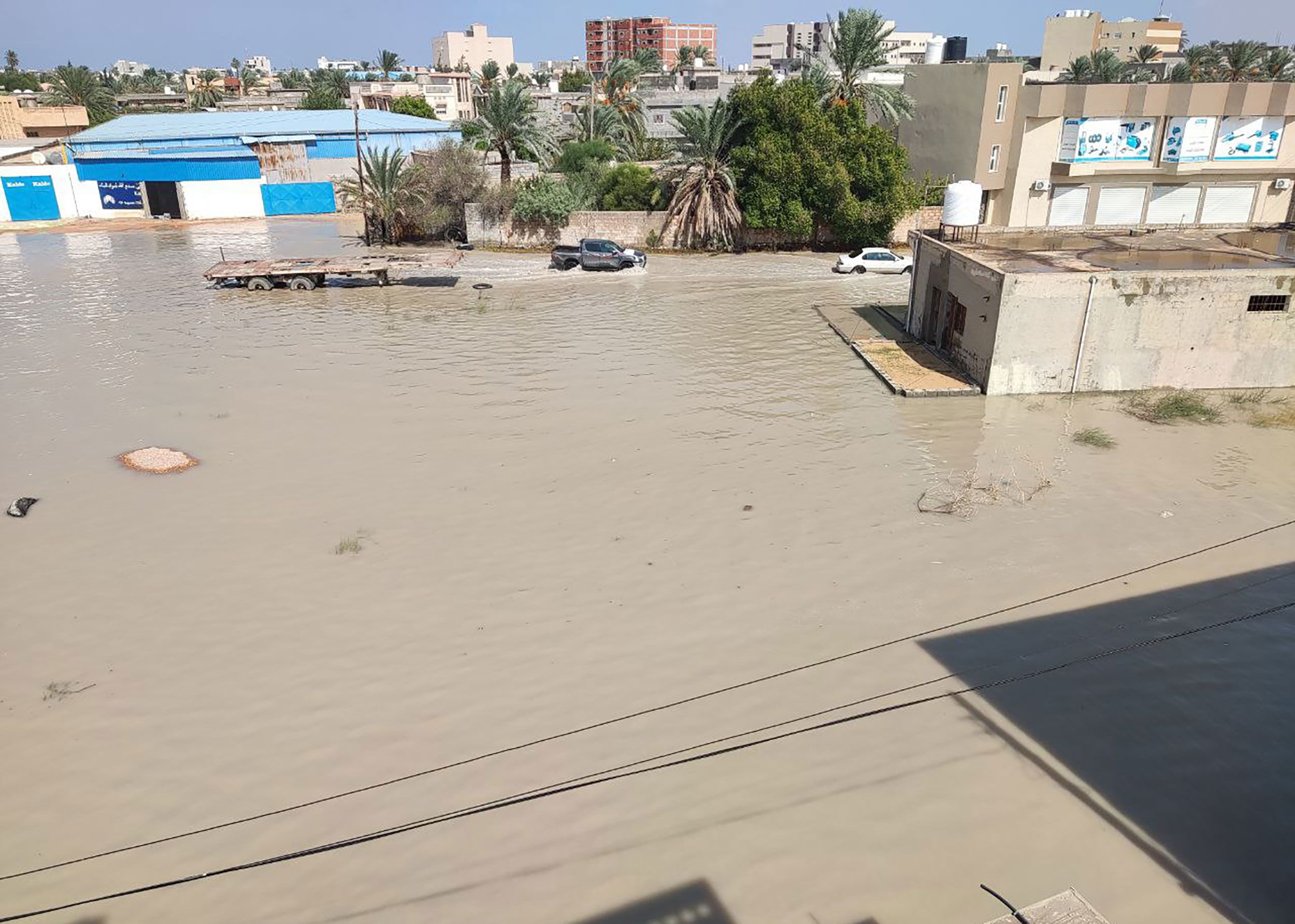 Settlements, vehicles and workplaces damaged after floods caused by heavy rains in Misrata, Libya o...