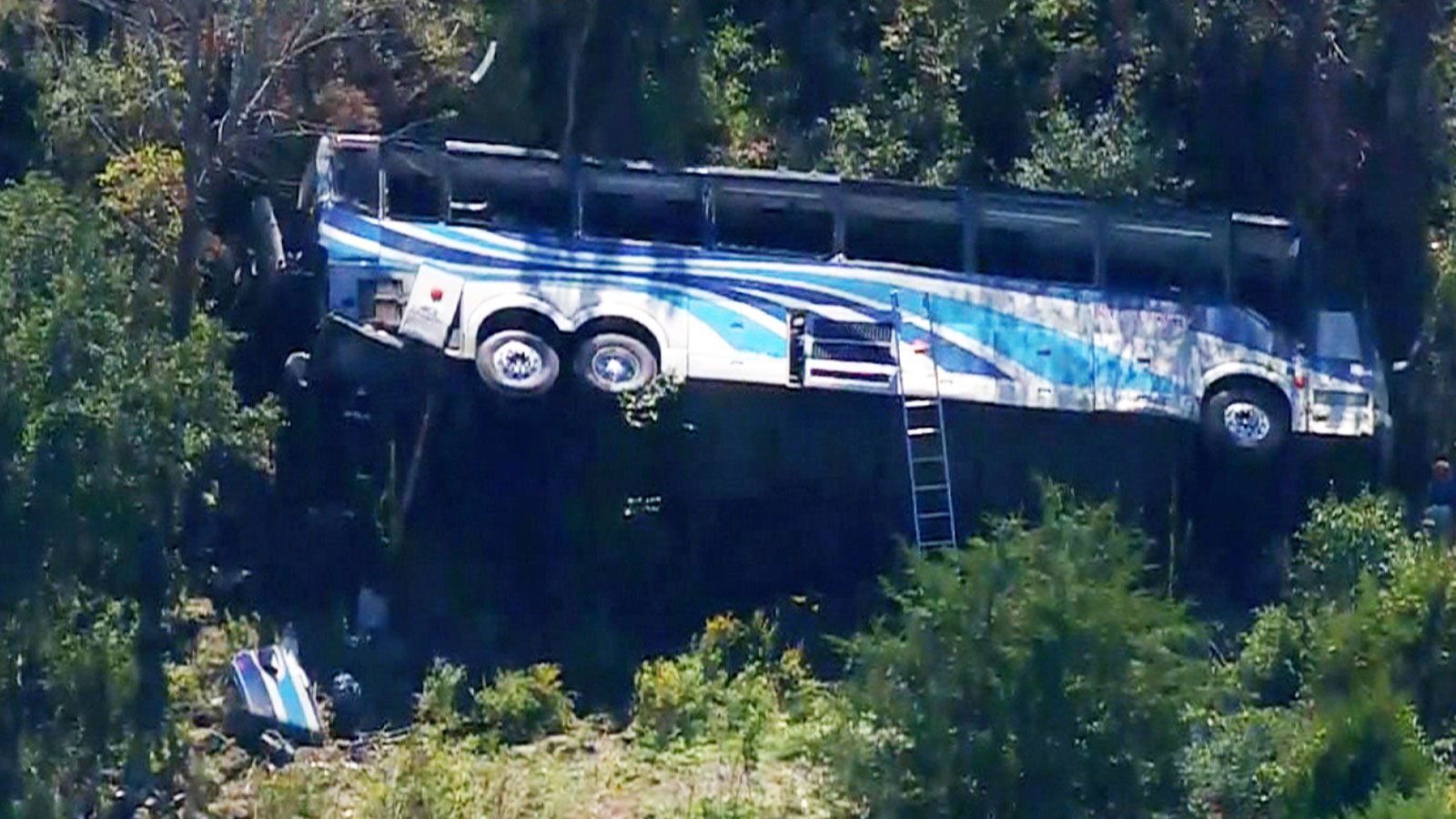 Image of a bus overturned. It was carrying students from Farmingdale High School in Long Island cra...