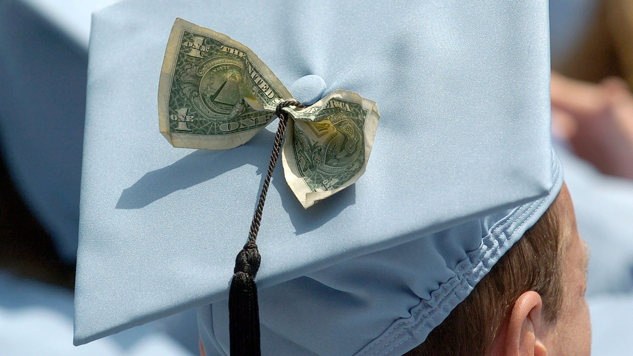 Image of a college graduate. For the first time in more than three years, federal student loan borr...