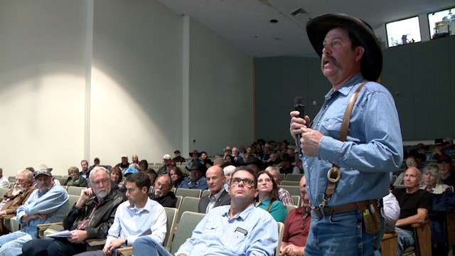 Garfield County cattle rancher Derrel Spencer speaks a meeting to discuss the Bureau of Land Manage...