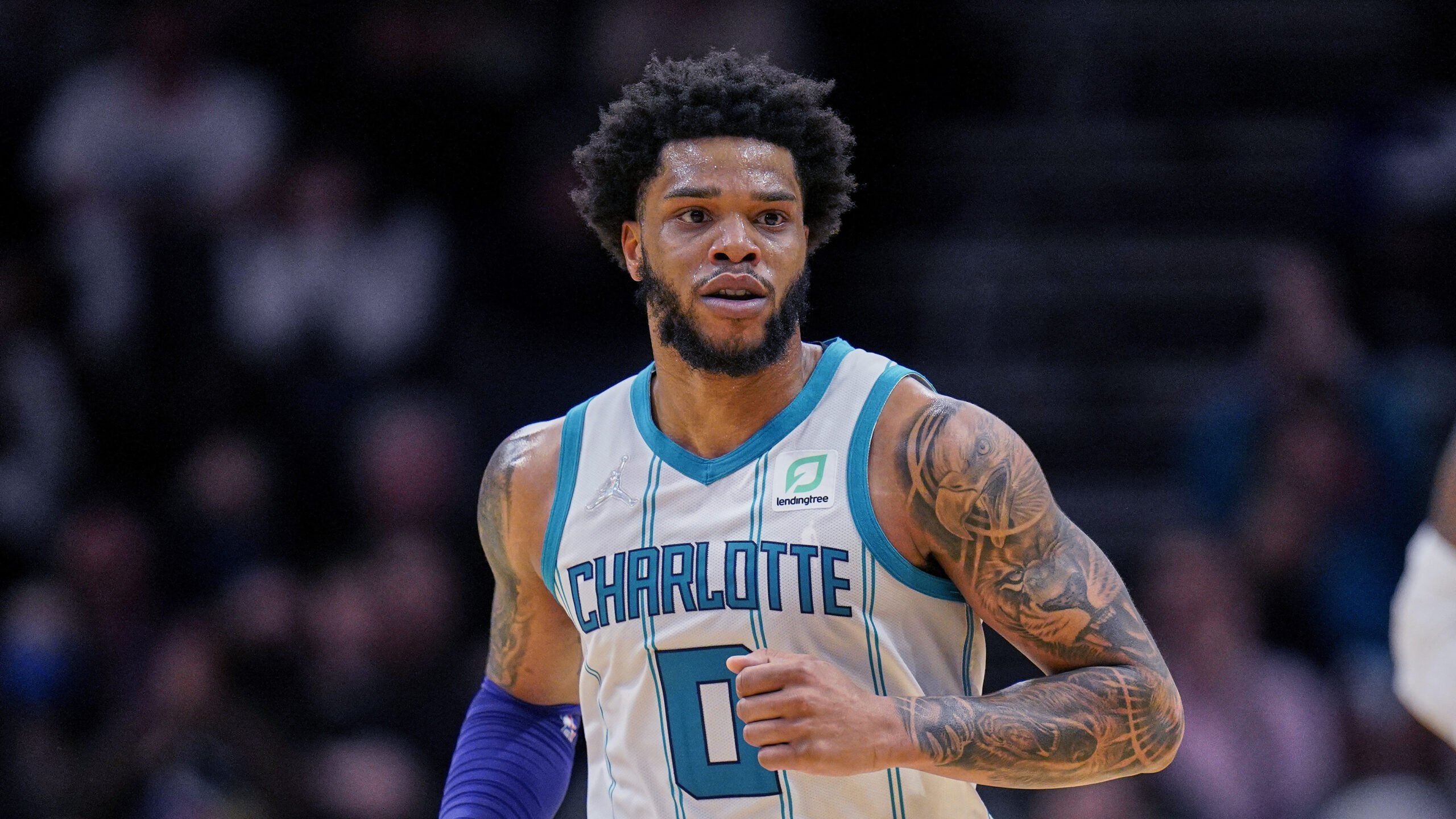 Charlotte Hornets forward Miles Bridges has turned himself in after a warrant was issued for an all...
