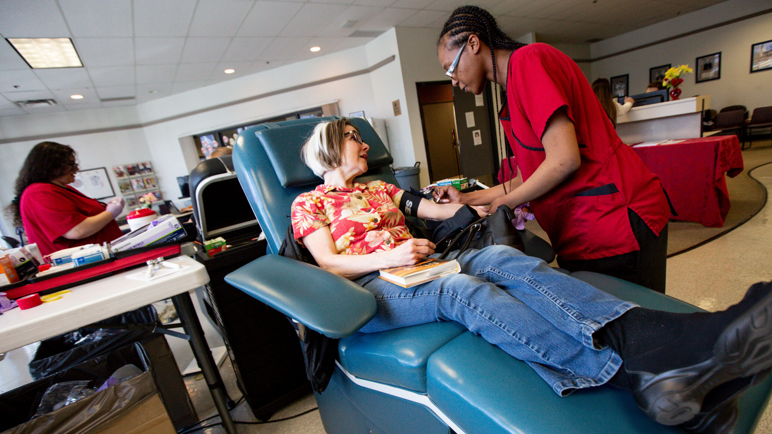 a person donates blood in a utah red cross center -- SALT LAKE CITY -- A blood shortage in Utah and...
