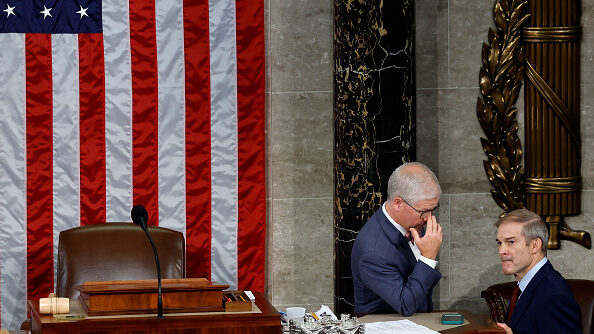U.S. Rep. Jim Jordan (R-OH) (R) talks to Speaker Pro Tempore Rep. Patrick McHenry (R-NC) as the Hou...