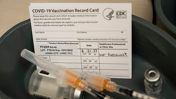 Image of a COVID-19 vaccination card, which, the CDC announced this week, it will no longer provide...
