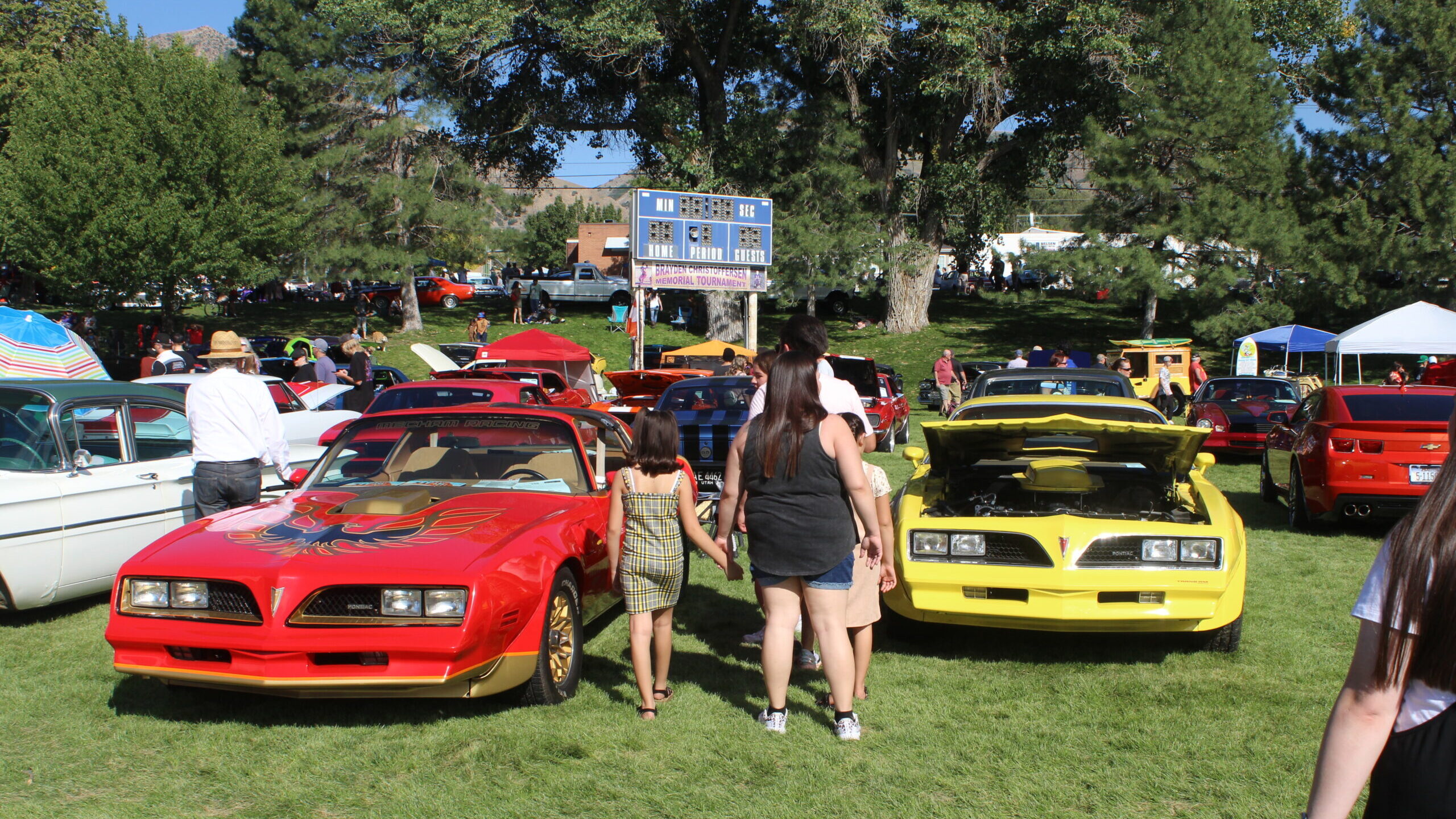 Attendees look at cars at the Kulture Krash Car Show....
