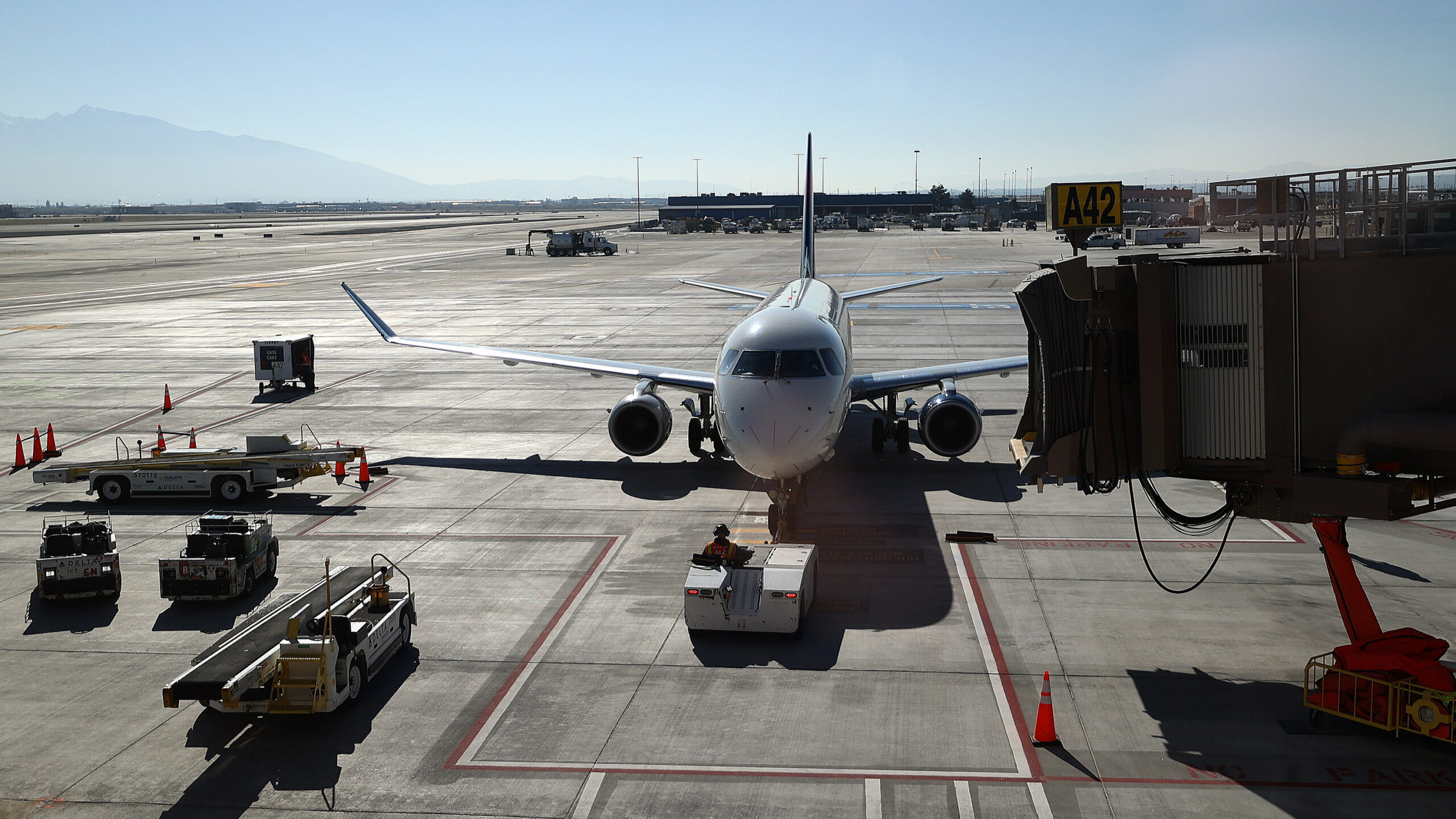 A plane is parked at Salt Lake City International Airport. The Utah grand jury indicted a pilot for...