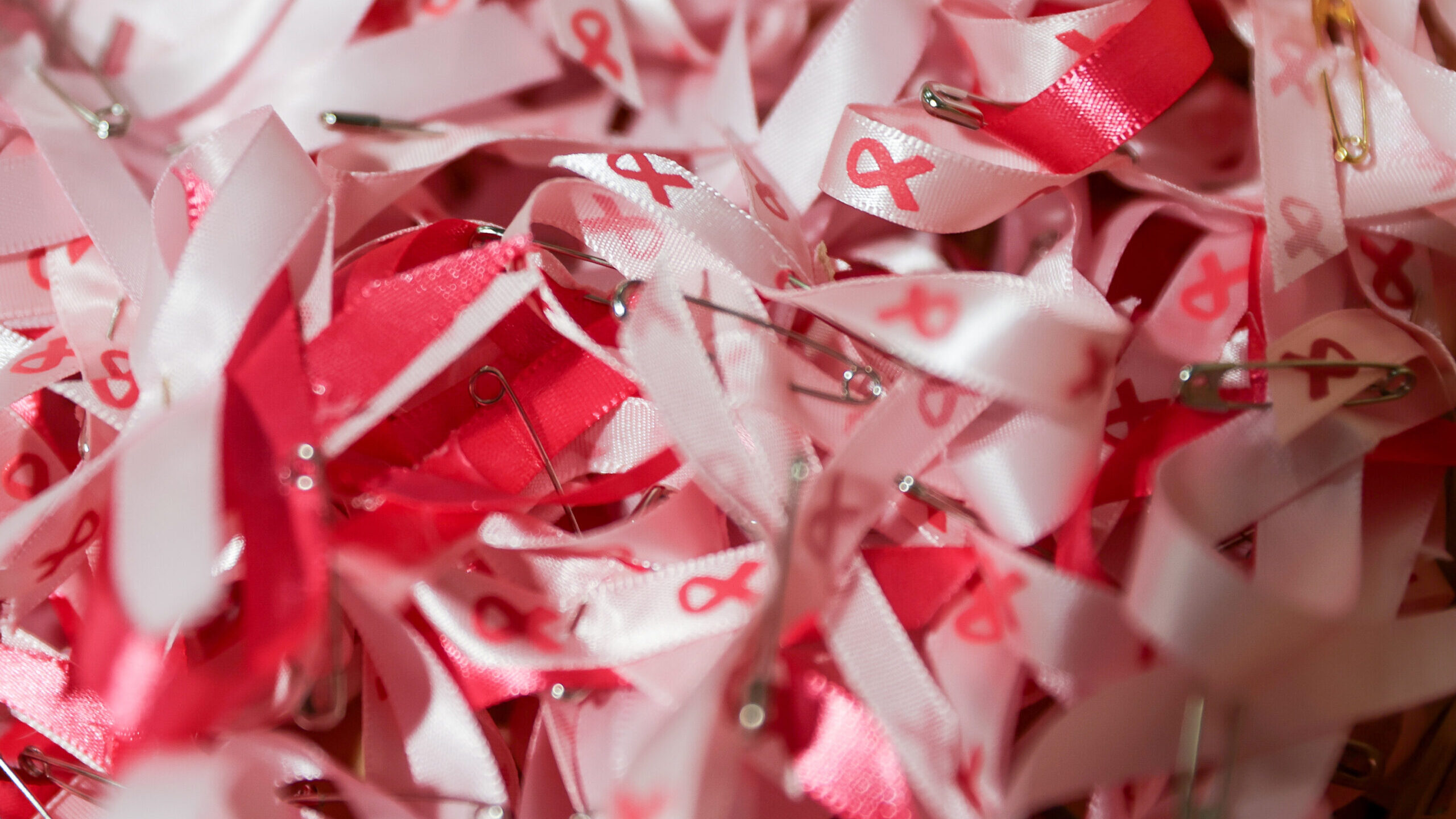 Image of small breast cancer awareness ribbons to mark the beginning of breast cancer awareness mon...