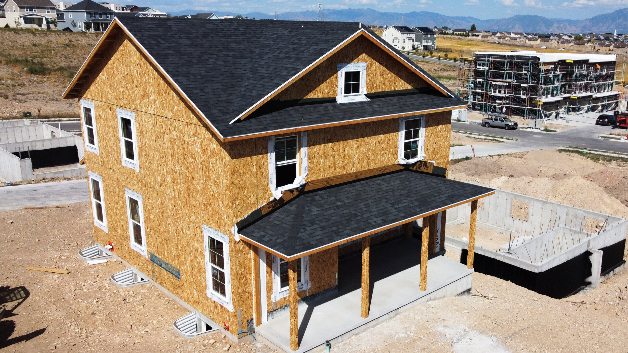 Image of new single family homes under construction in the South Jordan area of the Salt Lake Valle...