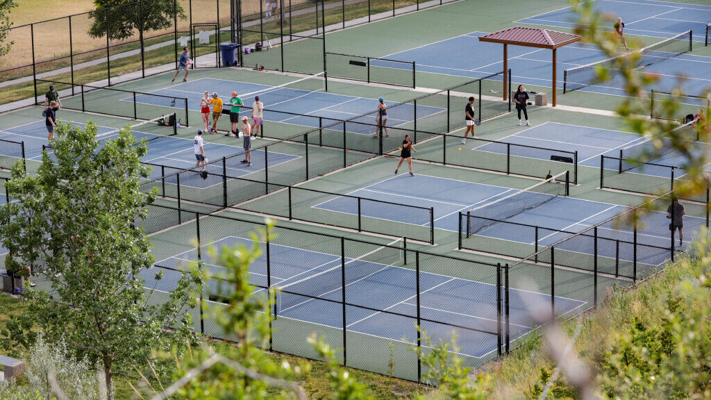 Image of people playing pickleball at the 11th Avenue Park in Salt Lake City on Thursday, June 30, ...