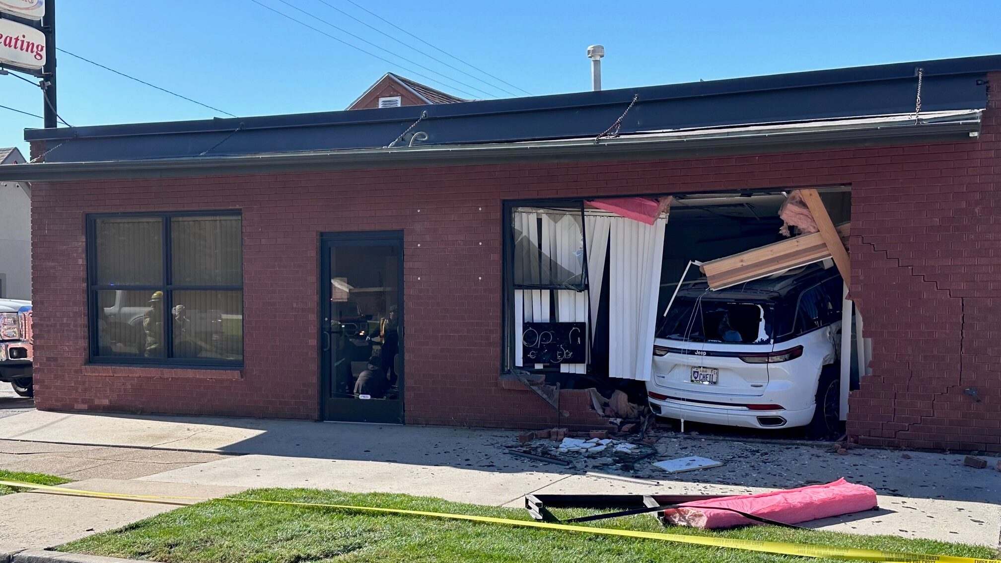 A white Jeep crashed into a building in Ogden after the driver experienced a medial issue and lost ...